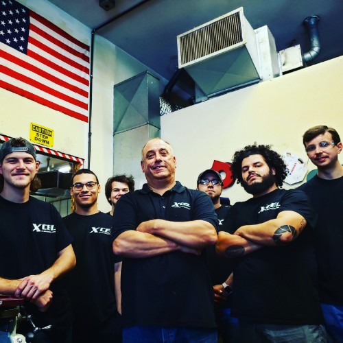 XCEL team in the shop